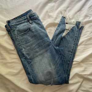 medium wash denim distressed skinny jeans
